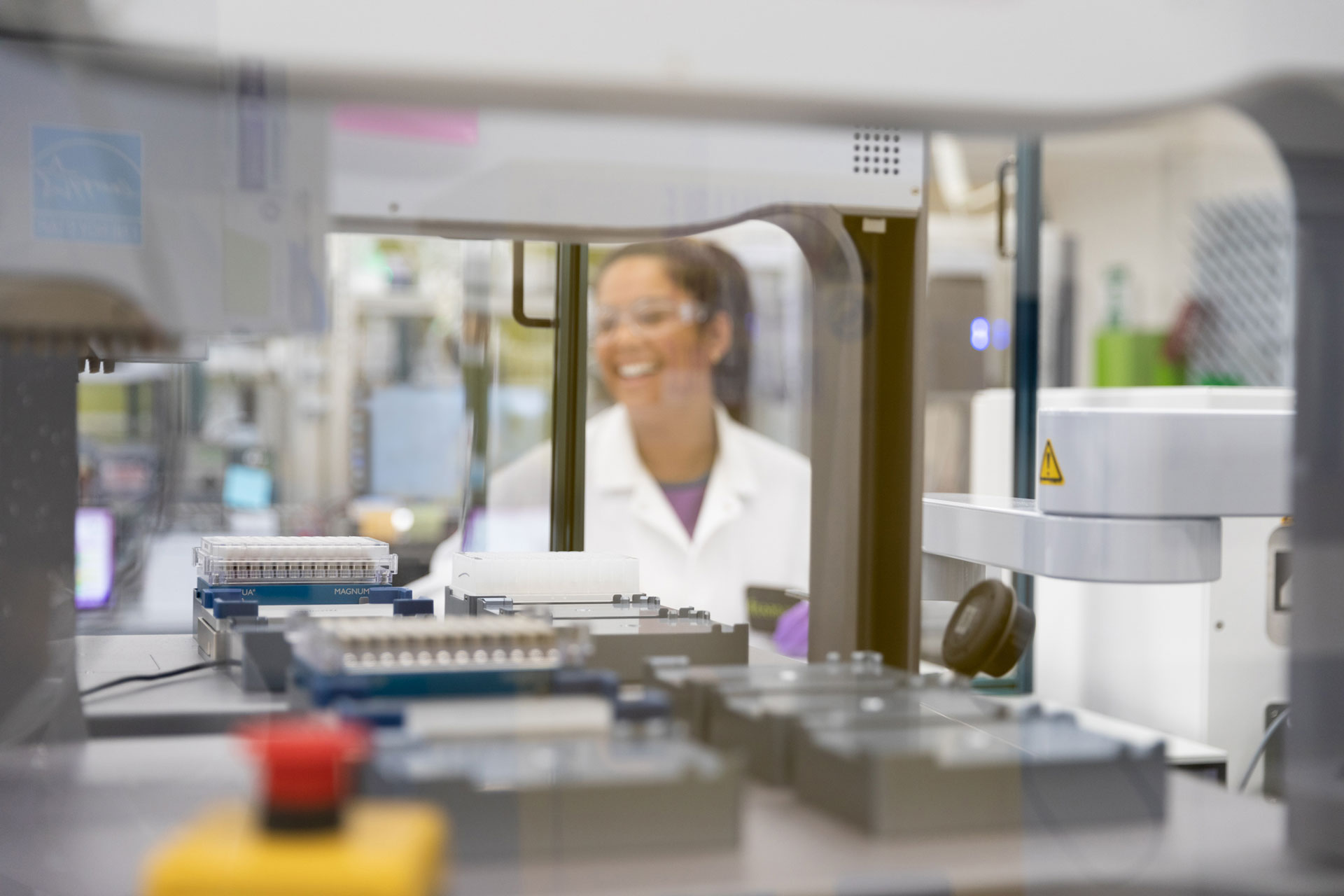 A clinician working in a Freenome laboratory where early cancer detection matters