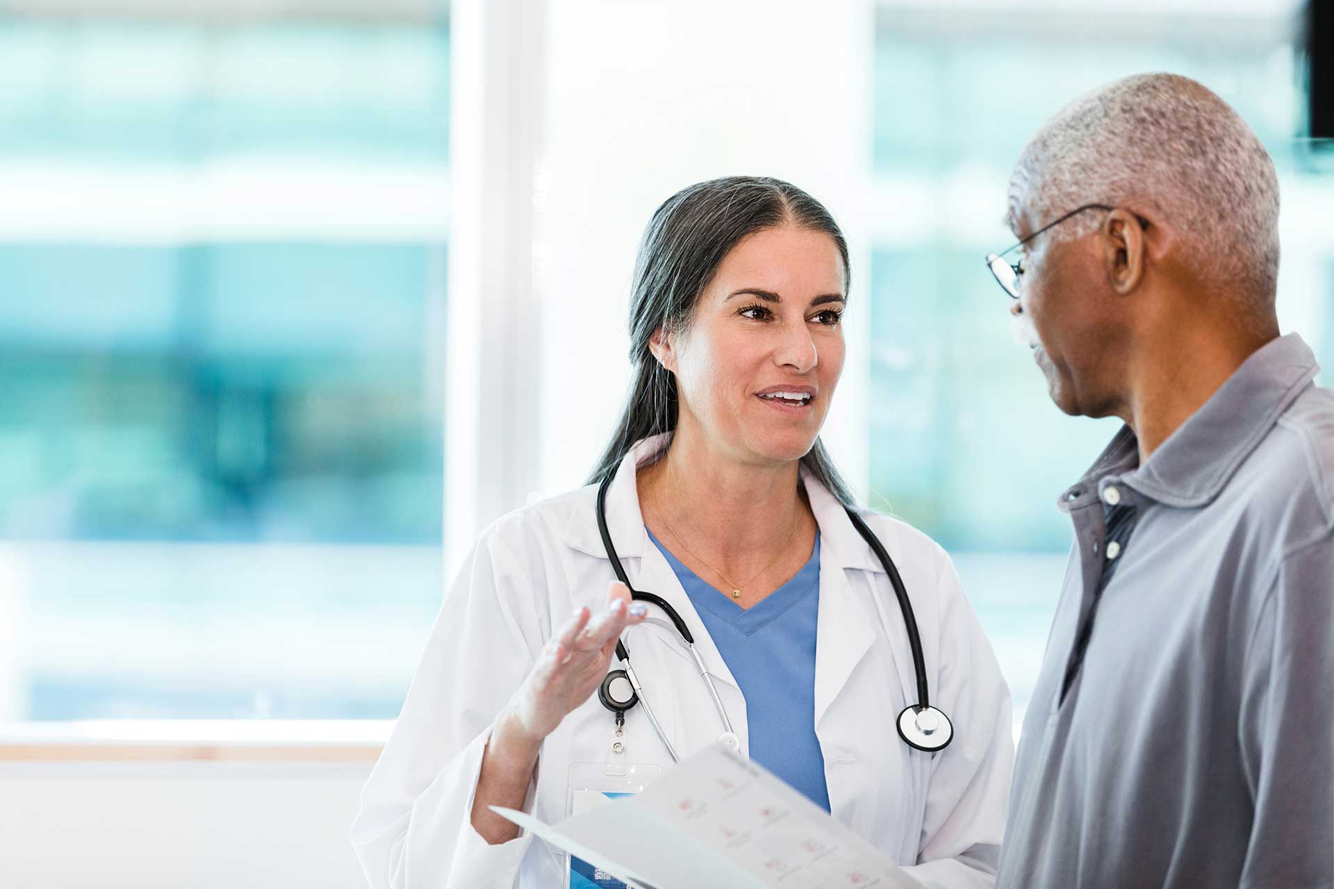 A doctor having a discussion with a patient
